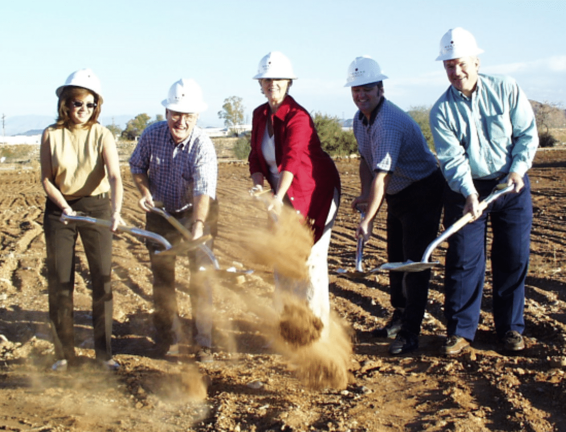 A group of people at the Cerebral Palsy of Arizona pediatric therapy center holding shovels. A group of people at the Cerebral Palsy of Arizona pediatric therapy center holding shovels.