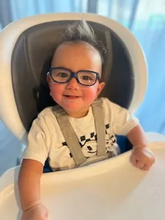 Ace for UCP Ace our UCP ambassador getting ready to eat in a high chair