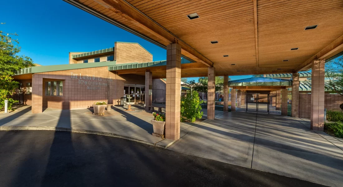 A pediatric therapy center with a wooden roof. Laura Dozier center entrance