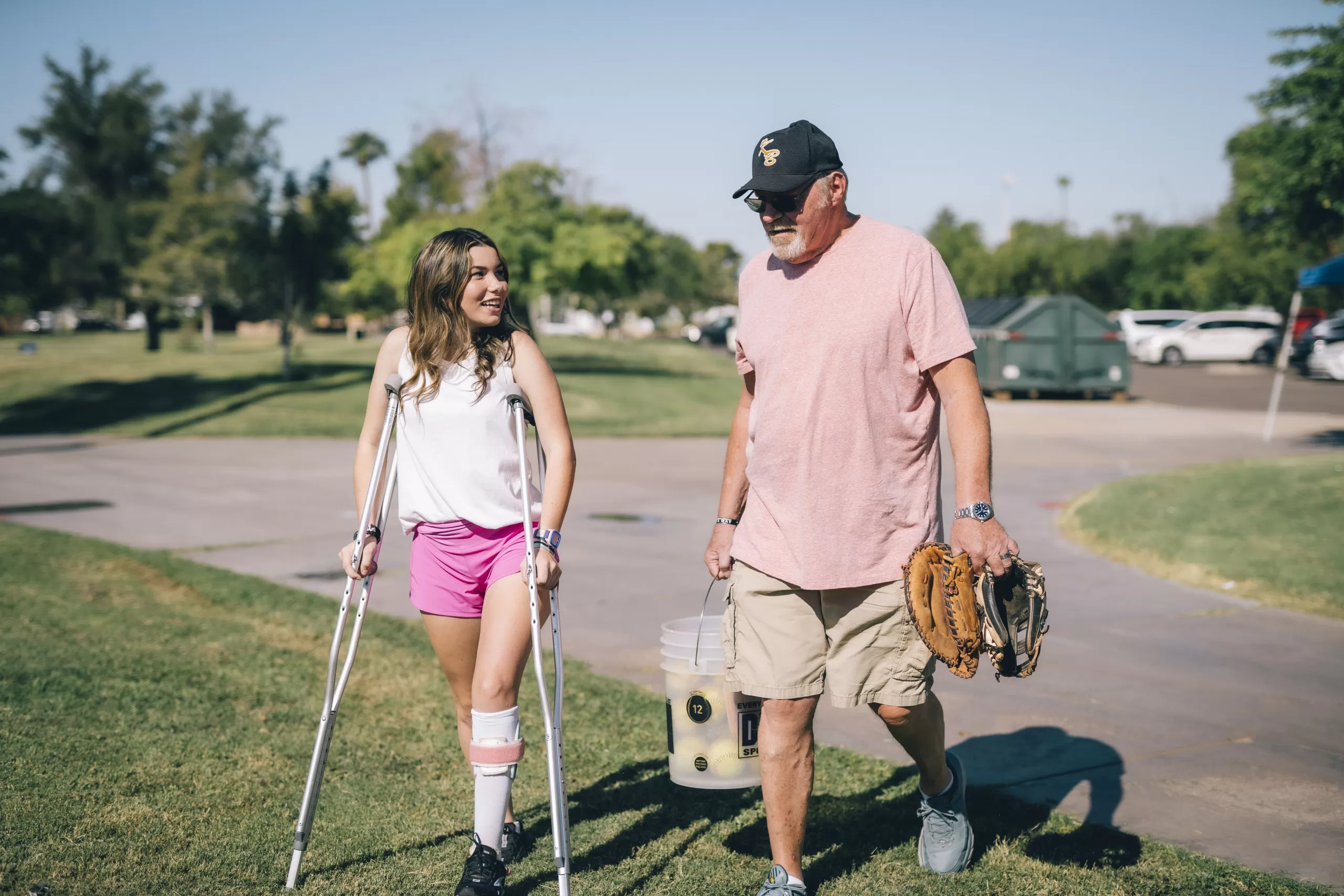 Charlie with Dad practicing softball